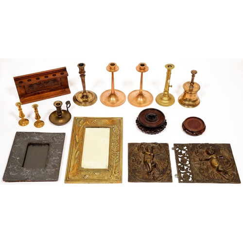 108 - Miscellaneous metalware, early 19th c and later, including brass mirror, brass panels and candlestic... 