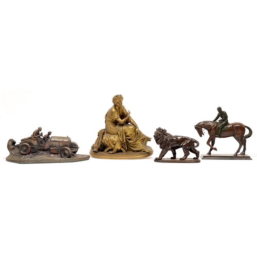 110 - A brass classical figure, horse and rider figure, faux bronze lion and replica 1920s inkwell and pen... 