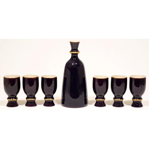 61 - A Carlton Ware purple decanter and six goblets (7)