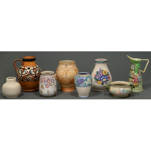 65 - Eight earthenware vases and jugs, to include Poole, Langley, Denby and Charlotte Rhead (8)... 