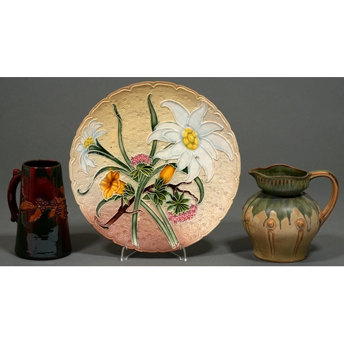 76 - An Elton ware Art Pottery jug, 16cm h,  another jug and a VBS majolica plate (3)