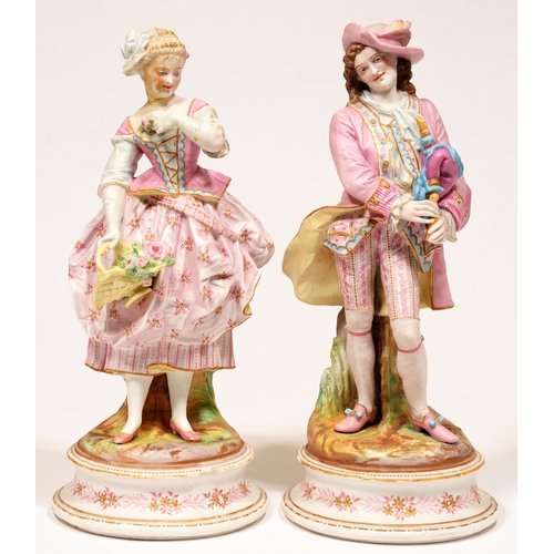 86 - A pair of French painted biscuit figures, 19th c, 44cm