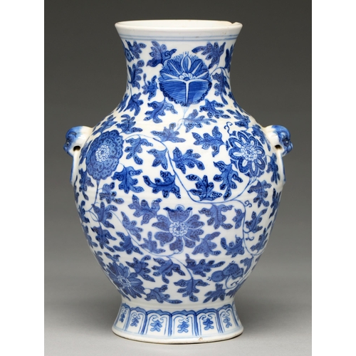 100 - A Chinese blue and white vase, 19th c or later, painted in Ming style with lotus meander, 24.5cm h, ... 