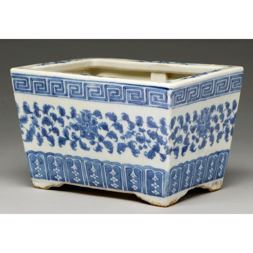 112 - A Chinese blue and white jardiniere, late 19th / early 20th c, painted with lotus meander between fr... 