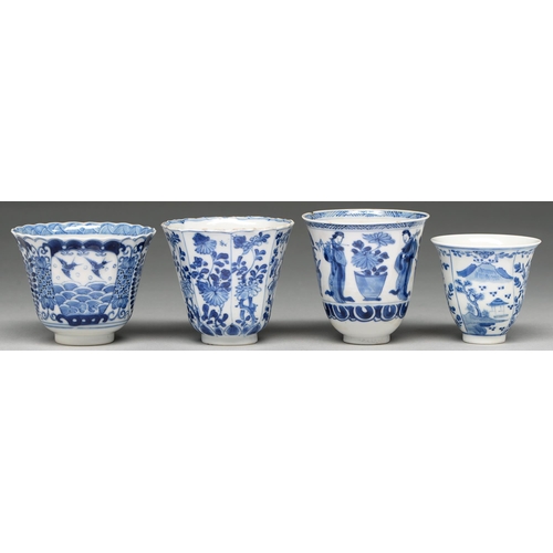 116 - A Chinese blue and white octagonal beaker, Kangxi period, painted in upright registers with flowerin... 