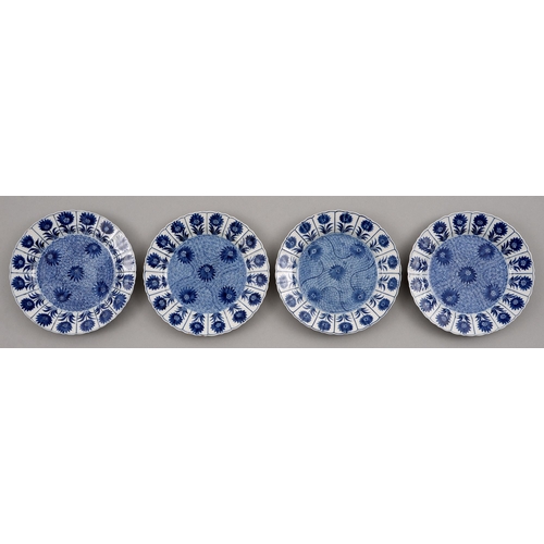 128 - Four Chinese blue and white plates, 18th c, painted with the aster pattern, 23cm diam... 