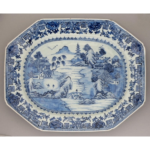 136 - A Chinese blue and white dish, 18th c, painted with a river scene, the border with diaper, fret and ... 