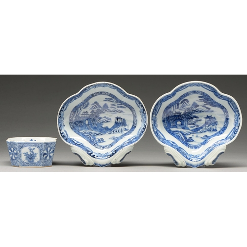 146 - Two Chinese blue and white shell shaped dessert dishes, early 19th c, painted with riverside buildin... 