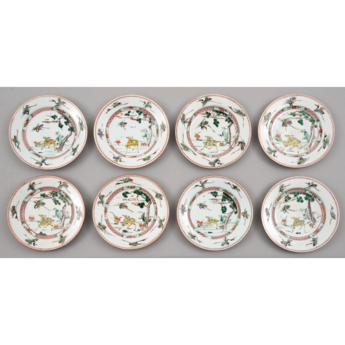 147 - Eight Chinese famille verte 'Deer and Crane' plates, Kangxi period, enamelled with a yellow deer wit... 