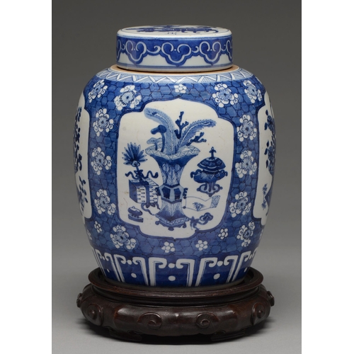 160 - A Chinese blue and white jar and cover, late 19th c, painted with a basket of flowers or precious ob... 