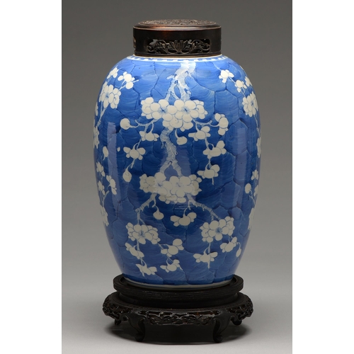 161 - A Chinese blue and white jar, late 19th / early 20th c, painted with prunus on a cracked ice ground,... 