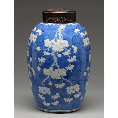 161 - A Chinese blue and white jar, late 19th / early 20th c, painted with prunus on a cracked ice ground,... 