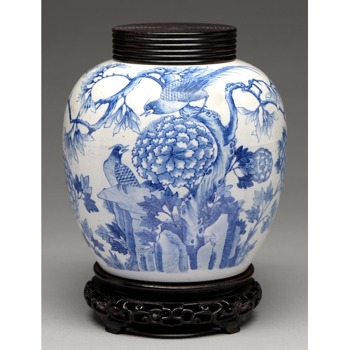 164 - A Chinese blue and white jar, 19th c or later, painted with birds in branches and peonies, 21cm h... 