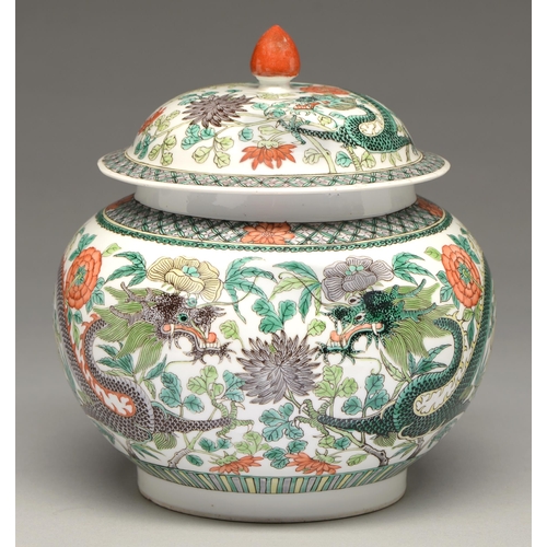 165 - A Chinese famille verte jar and cover, 19th / 20th c, enamelled with dragons and flowers in diaper b... 