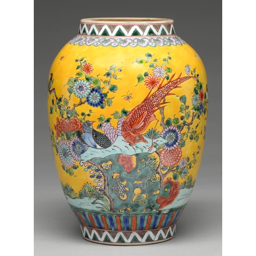 169 - A Chinese yellow ground famille rose jar, 20th c, enamelled with birds, waterfowl and flowering plan... 