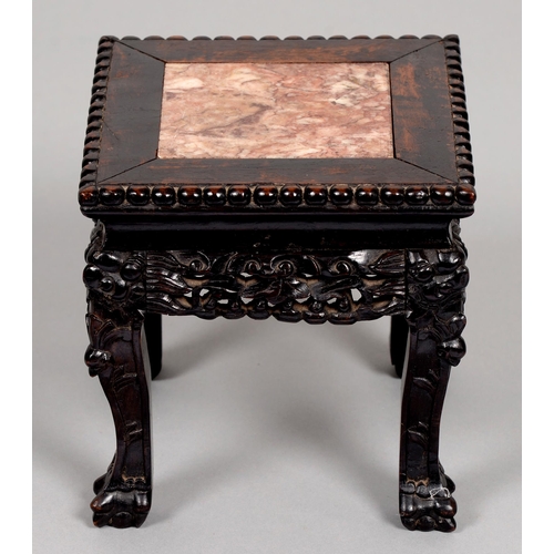 179 - A Chinese hardwood stand, c1900, with stone-inset beaded square top and carved and pierced gallery, ... 