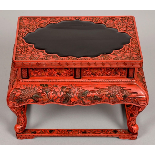 180 - A Chinese cinnabar lacquer stand, 19th / early 20th c, the unadorned glossy black shaped centre of t... 