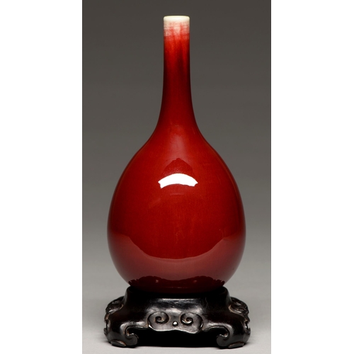 192 - A Chinese flambe glazed vase, 20th c, of slender bulbous form, the glaze thinning slightly at the ne... 