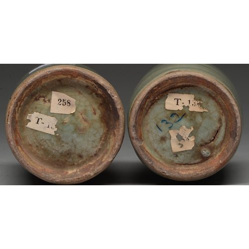 196 - Two Chinese celadon tea caddies, 19th c, the neck unglazed, associated silver coloured metal covers,... 