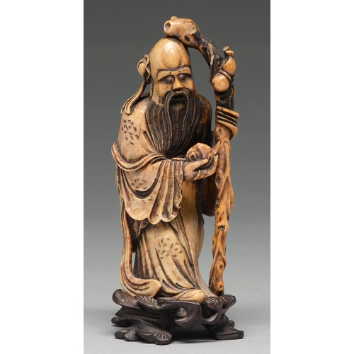 204 - A Chinese soapstone carving of Shouxing, 18th c, 14cm h  Provenance: Collection of Commander Francis... 