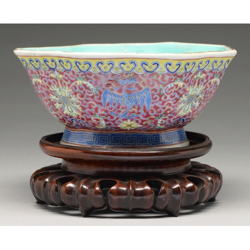 209 - A Chinese famille rose bowl, 20th c,  enamelled with lotus and phoenix between yellow ruyi and blue ... 