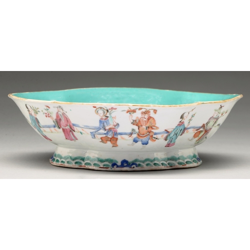 211 - A Chinese famille rose bowl, 19th c, enamelled with twelve individual figures in a continuous landsc... 