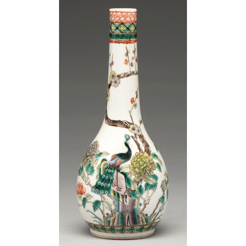 212 - A Chinese famille verte vase, 20th c, enamelled with a peacock and peonies beneath a venerable pine ... 