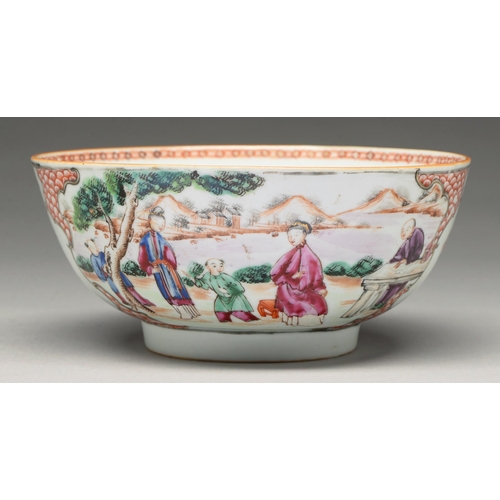 218 - A Chinese famille rose bowl, c1770, painted with two groups of figures by water in a mountainous lan... 