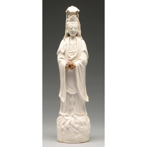 228 - A Chinese blanc de chine figure of Guanyin, 18th c, with associated giltwood and composition hands, ... 