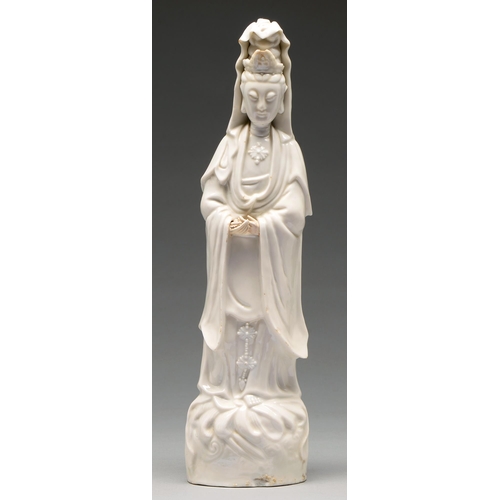 229 - A Chinese blanc de chine figure of Guanyin, 18th c, the hands originally detachable, 44cm h... 