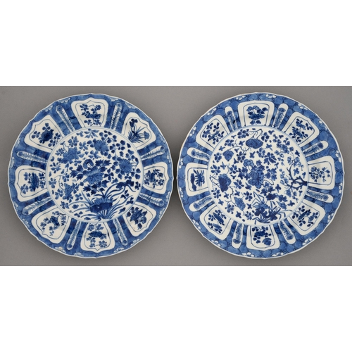 240 - Two Chinese blue and white dishes, Kangxi period, painted with lotus or flowers, the border of lotus... 