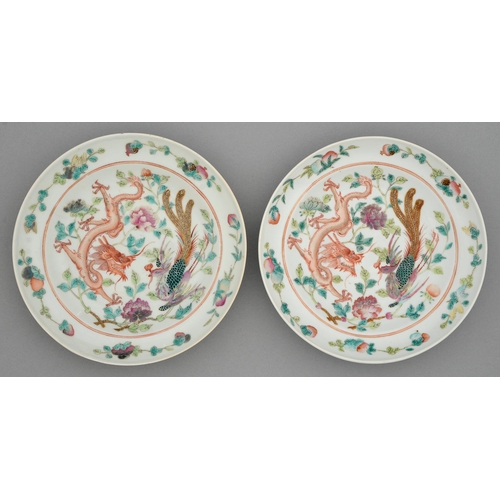 241 - Two Chinese famille rose plates, 19th c and later, painted with a four-clawed dragon and phoenix wit... 