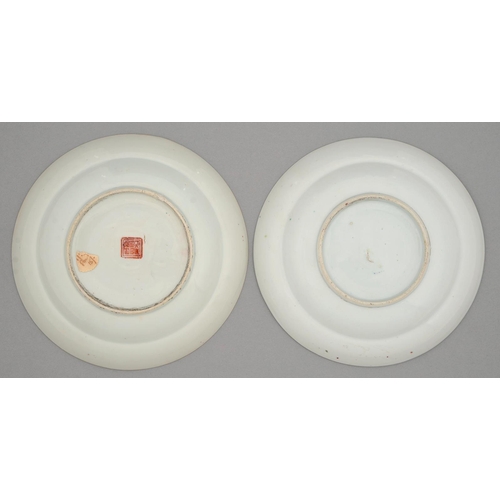 241 - Two Chinese famille rose plates, 19th c and later, painted with a four-clawed dragon and phoenix wit... 