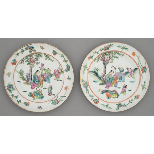 242 - Two Chinese famille rose plates, late 19th c, painted with a lady at a table attended by seven young... 