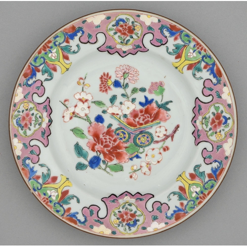 244 - A Chinese famille rose plate, 18th c, painted with flowers and prunus in a border of pink lappets wi... 