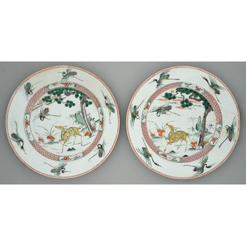 251 - Two Chinese famille verte dishes, Kangxi period, painted with a yellow deer, phoenix and sacred fung... 