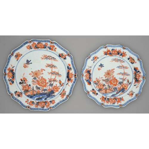 253 - A graduated pair of Chinese Imari plates, 18th c, of shaped outline with moulded rim, painted with p... 