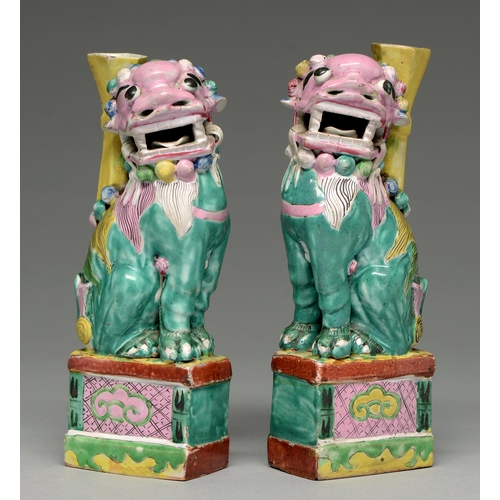 261 - Two Chinese polychrome dog of Fo censers, 19th c, the vivid green lion dog with pink head and green ... 