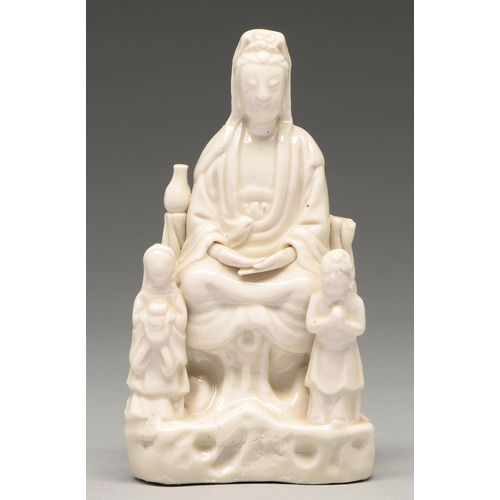 269 - A Chinese blanc de chine figure of Guanyin with two children, 19th c, 15cm h