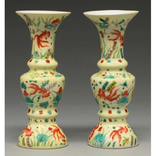 288 - A pair of Chinese yellow ground vases, possibly 19th c, enamelled with fan tailed fish, water plants... 