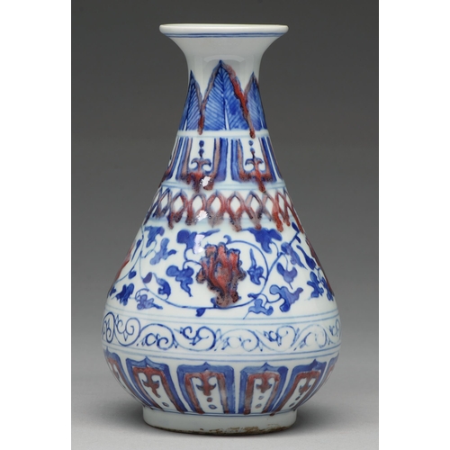 289 - A Chinese underglaze blue and red vase, painted in Ming style with formal band of flowers and scroll... 