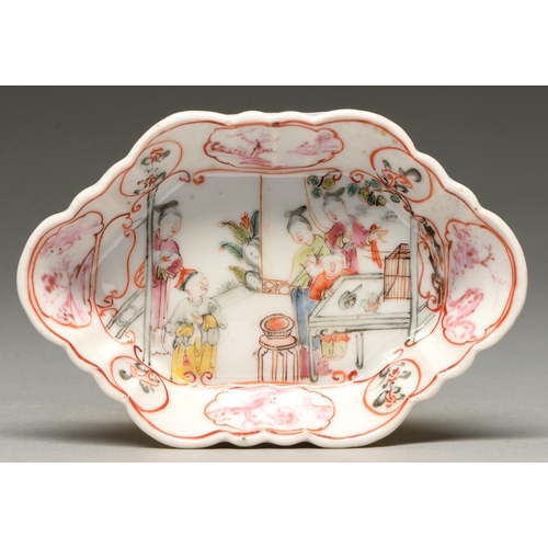 290 - A Chinese famille rose spoon tray, 18th c, painted with an interior scene of three ladies and two bo... 