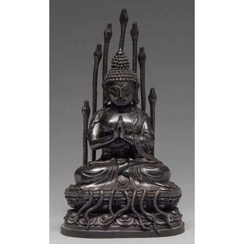 323 - A Tibetan bronze figure of Buddha Nagaraja, 18th c, seated in dhyanasana, the hands clasped in Uttar... 