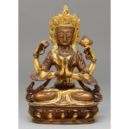 333 - A Sino Tibetan jewelled and gilt bronze figure of a Bodhisattva, 20th c, set with turquoise and cora... 