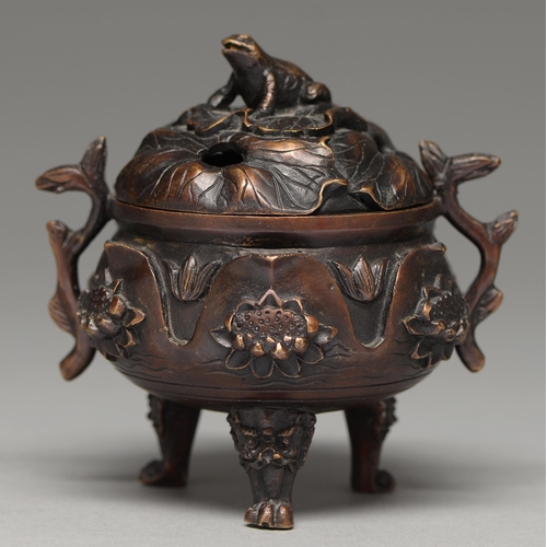 336 - A Chinese bronze tripod censer, 20th c, cast with lotus, the domed cover with toad finial, on three ... 