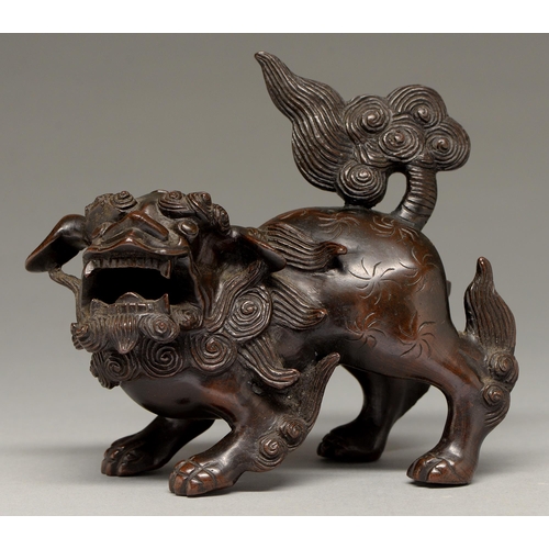 337 - A Chinese bronze sculpture of a dog of Fo, 19th c, 17cm h