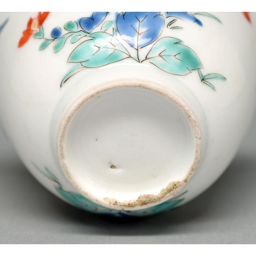 345 - A Kakiemon cup, Edo period, c1700, with rounded sides and slightly everted lip, enamelled with two c... 