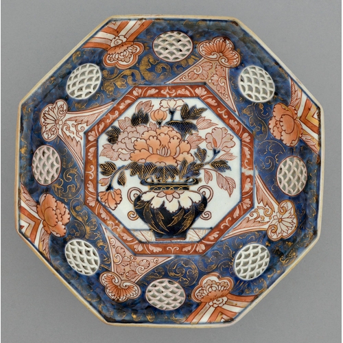 353 - An Imari octagonal dish, 18th c, pierced with seigaiha, painted to the centre in dark underglaze blu... 