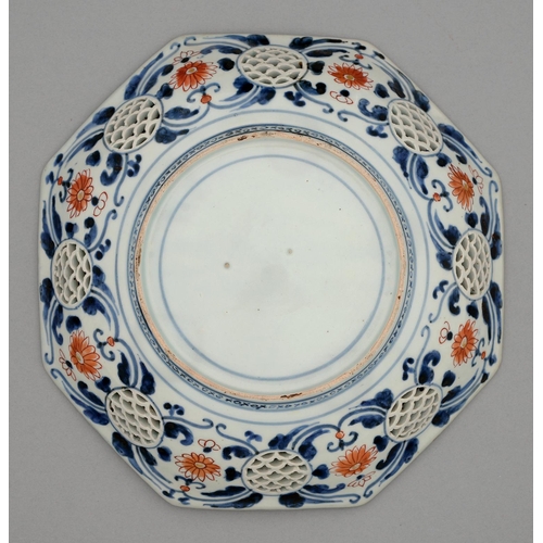 353 - An Imari octagonal dish, 18th c, pierced with seigaiha, painted to the centre in dark underglaze blu... 