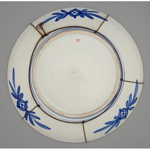 355 - An Imari dish, early 20th c, decorated to the centre with kiku and gilt karakusa scrolls in panelled... 